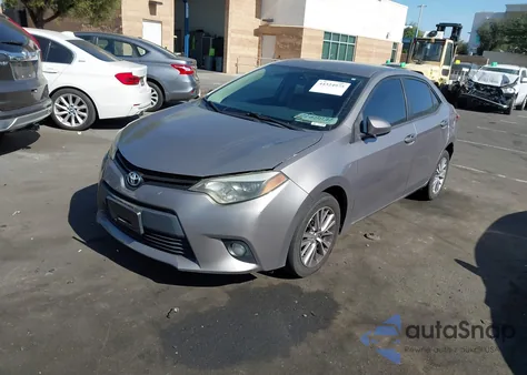 2014 Toyota Corolla Le Plus z USA, uszkodzony, nr VIN 5YFBURHE5EP073296